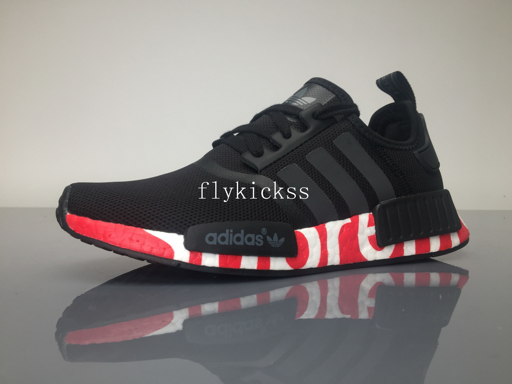 Supreme x Adidas NMD R1 Black Real Boost